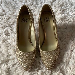 Gold stilettos